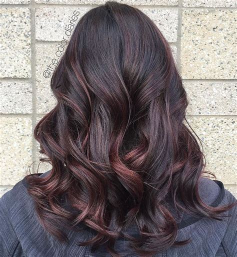 dark hair with burgundy highlights|brunette hair with burgundy highlights.